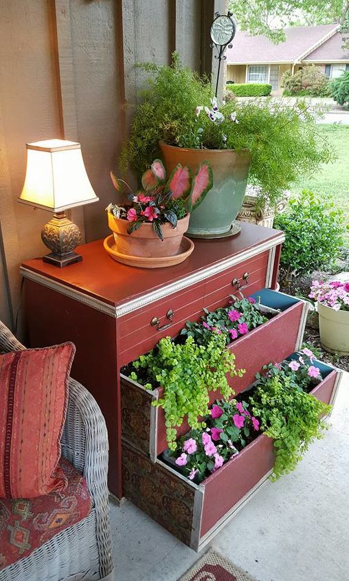 a dresser with plants on it